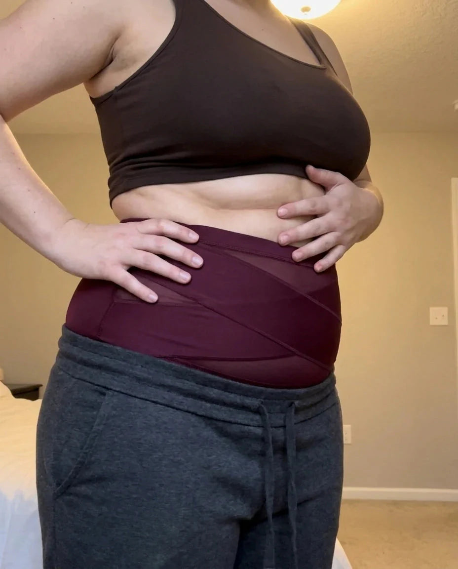 Woman wearing The Sculpt Brief under her clothes, side view